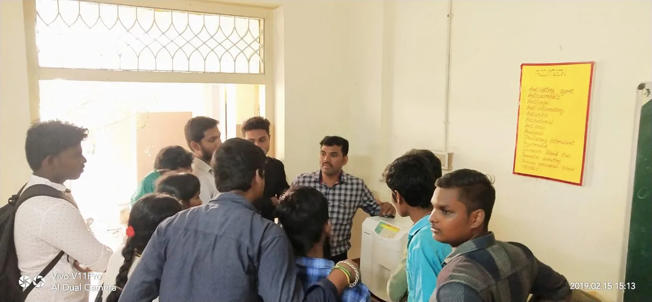 Students observing a practical equipment demonstration during institute learning